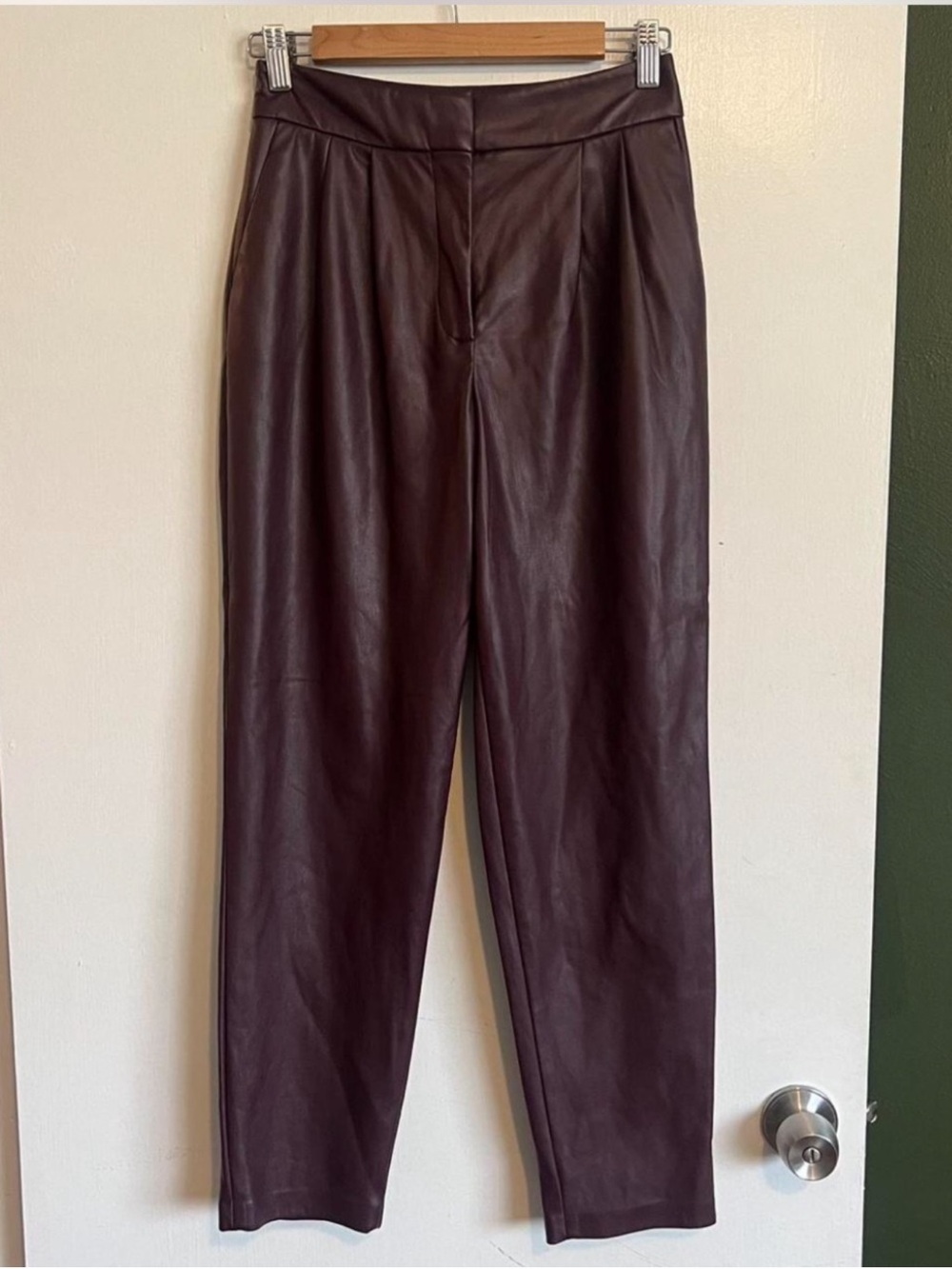 Express burgundy high rise faux leather pants 
size 2